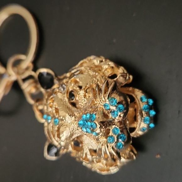 GOLDEN METAL AND RHINESTONES KEYCHAIN. - Picture 2 of 6
